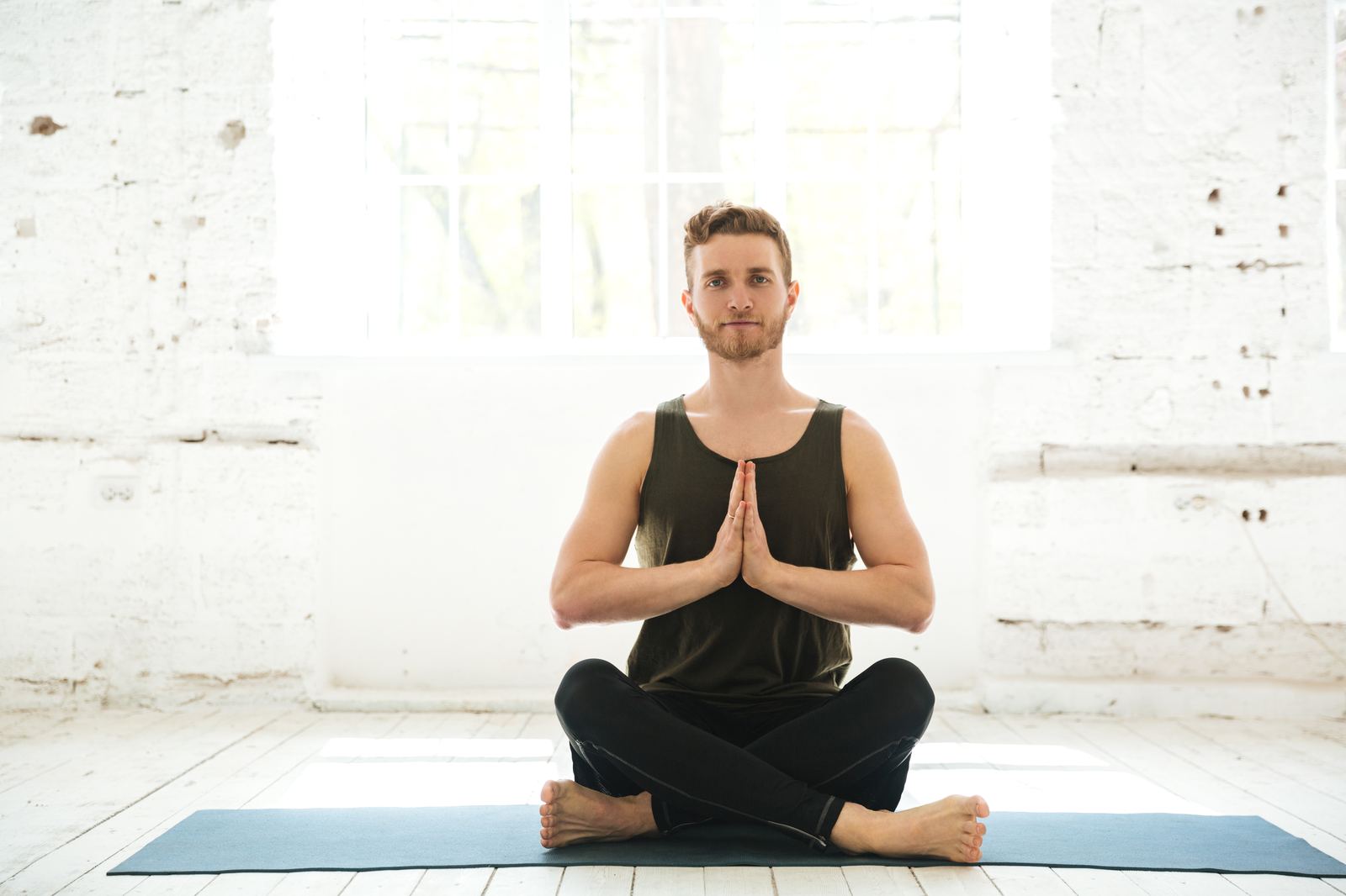 Man practising a weekly yoga routine